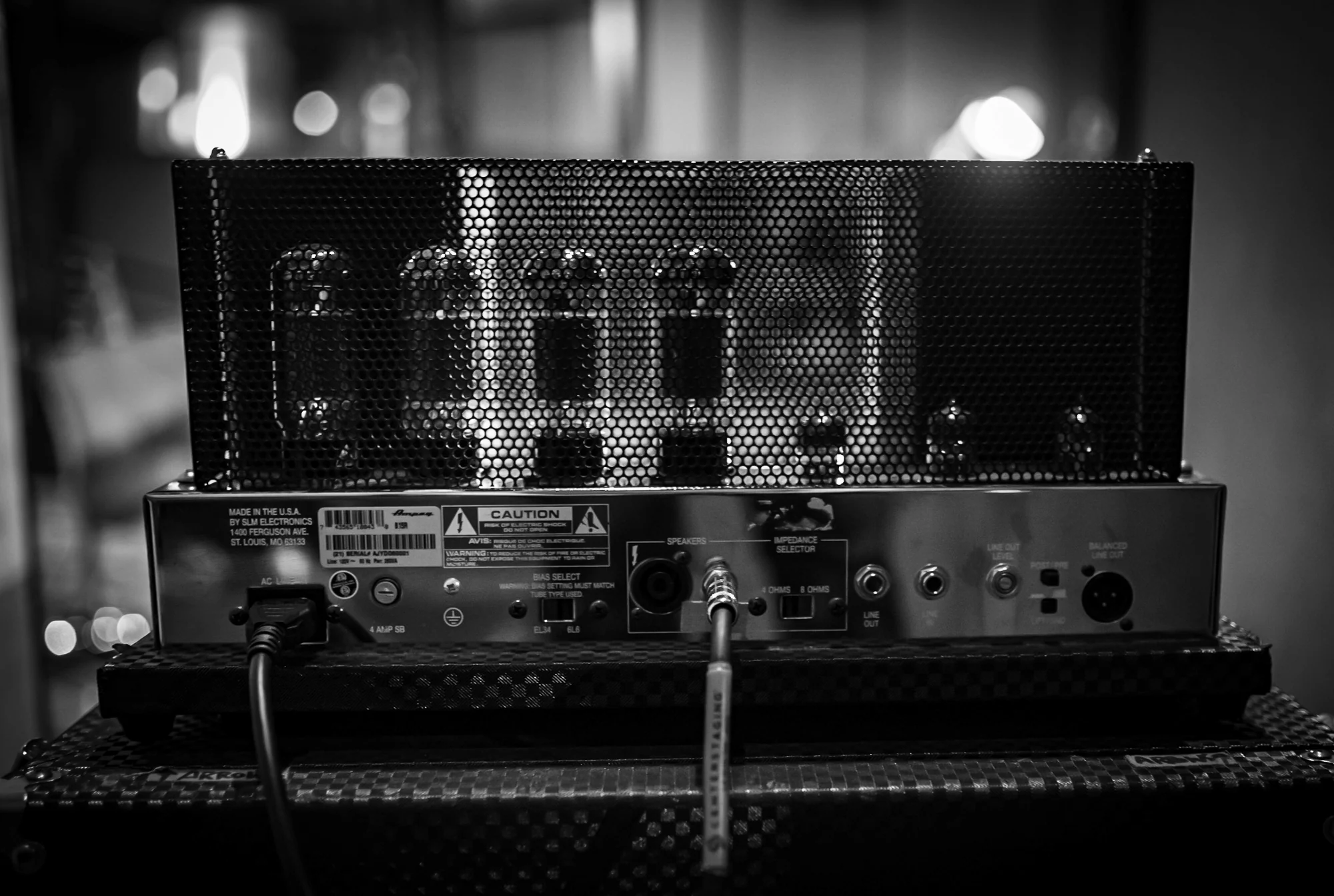Vacuum tubes glowing inside a bass amplifier